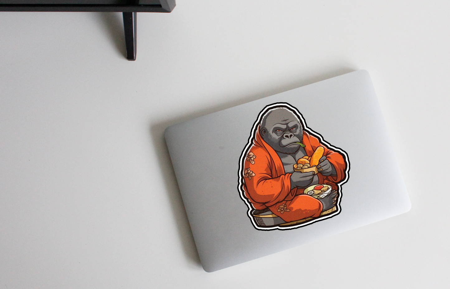 Enrich your life with our 'Gorilla Feast' sticker | A powerful gorilla ready to enjoy its meal! 